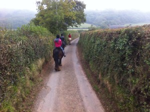 horse-riding-in-country-lane